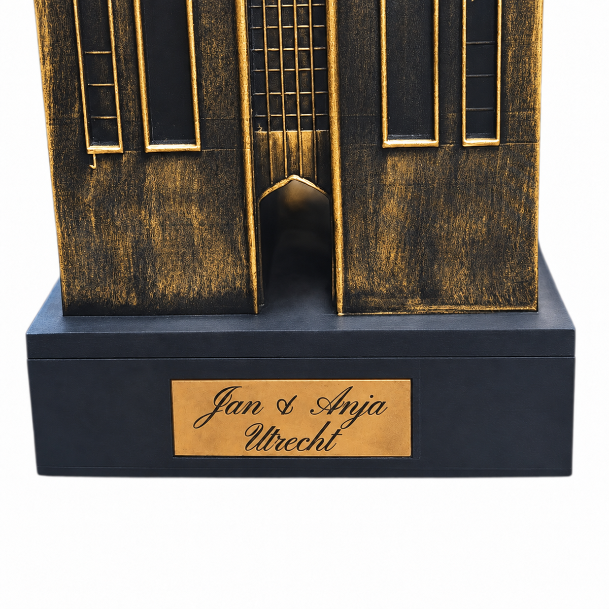 Voorbeeld van personalisatie op Domtoren Utrecht met voet, zwart-goud